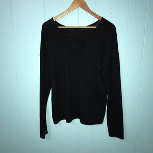 Black long sleeve with cross detailing